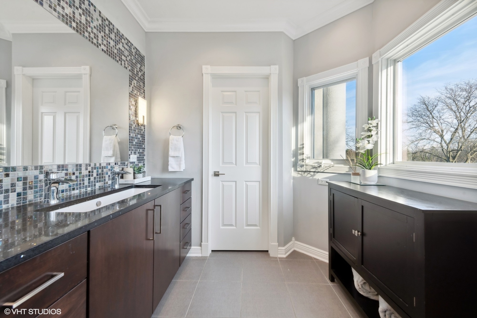 1853 Checker Road Long Grove, IL 60047 - Photo 38 of 63 a bathroom with a double vanity sink and a mirror