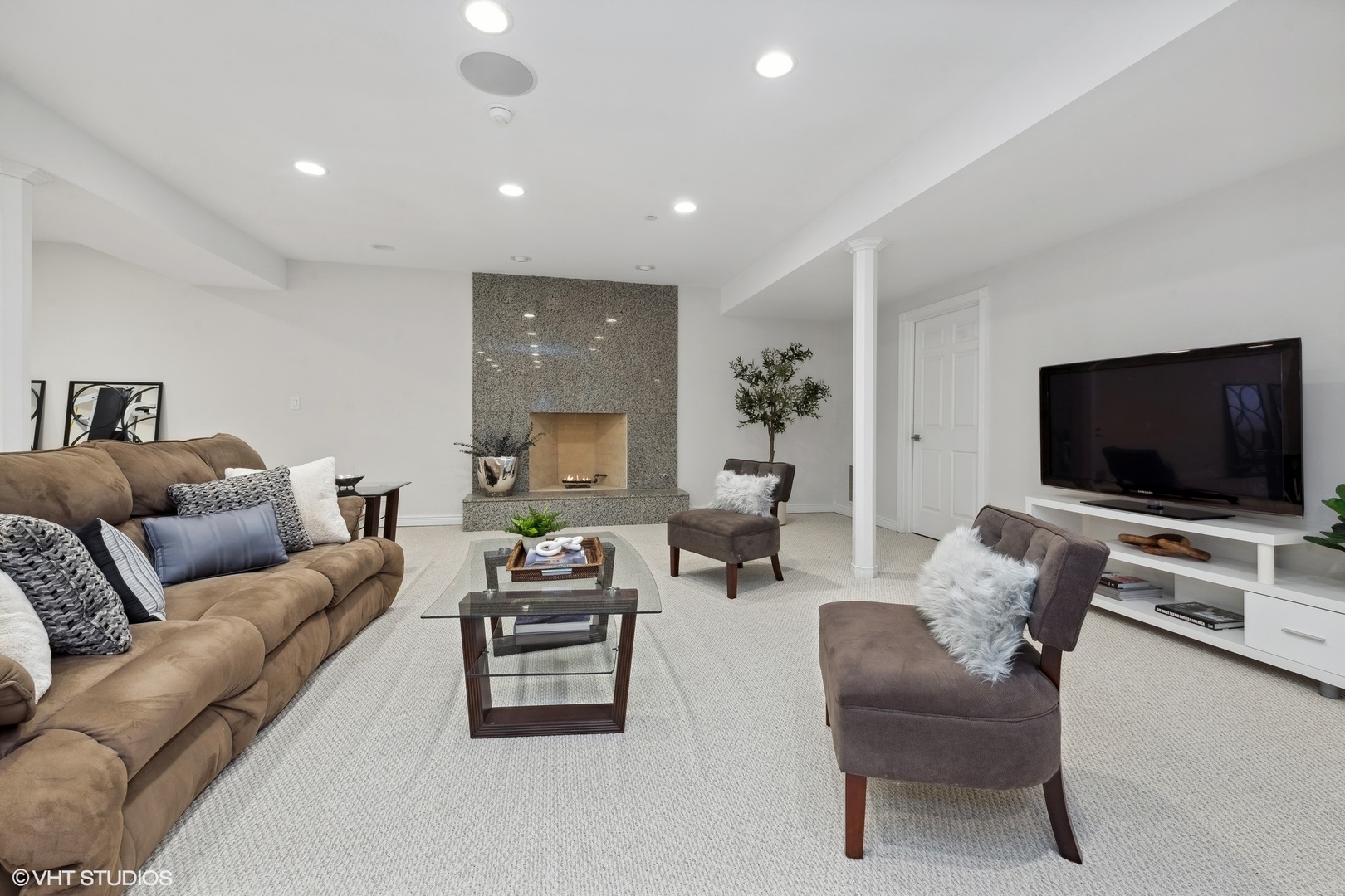 1853 Checker Road Long Grove, IL 60047 - Photo 49 of 63 a living room with furniture and a flat screen tv