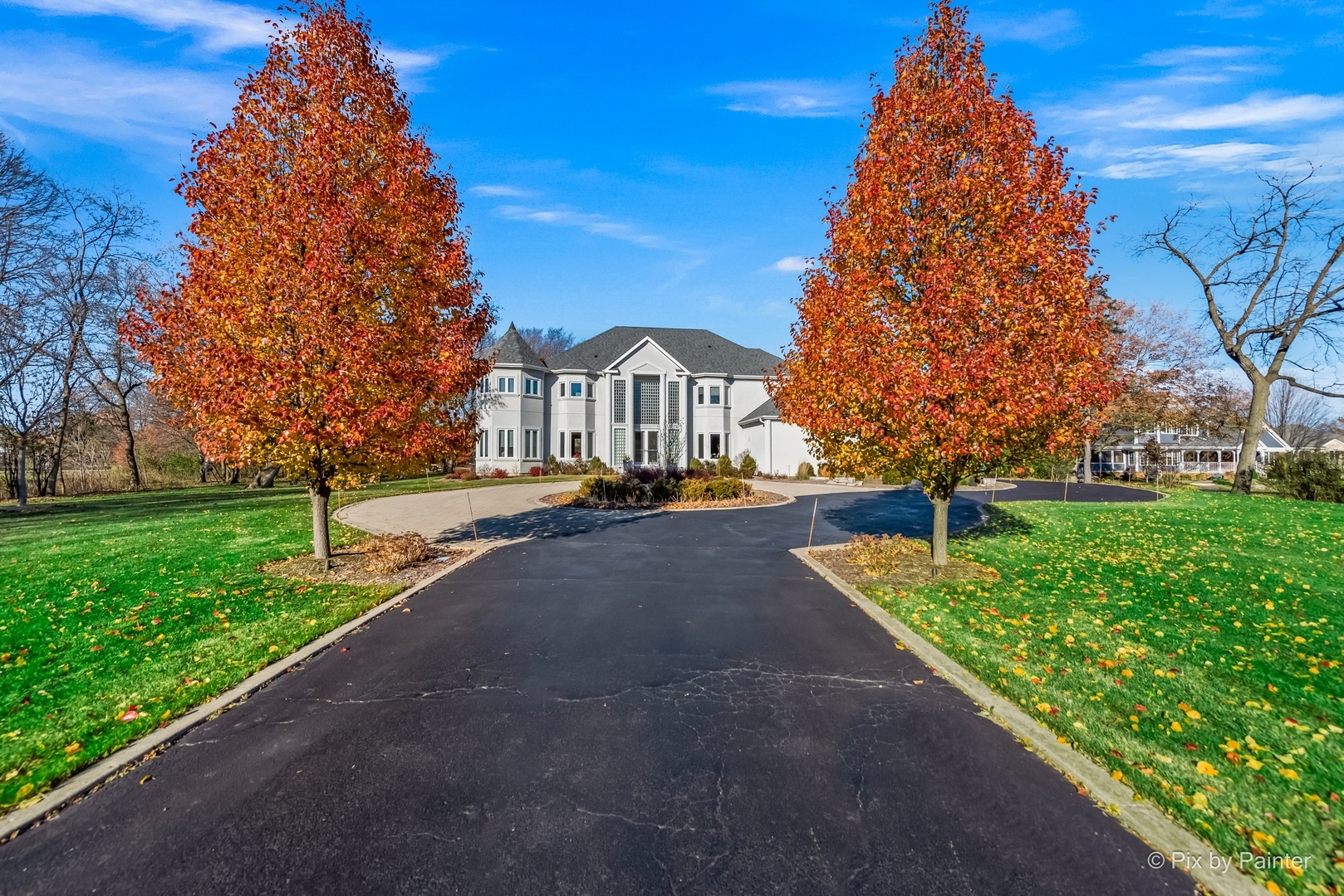 1853 Checker Road Long Grove, IL 60047 - Photo 5 of 63 a view of a street with houses on both side