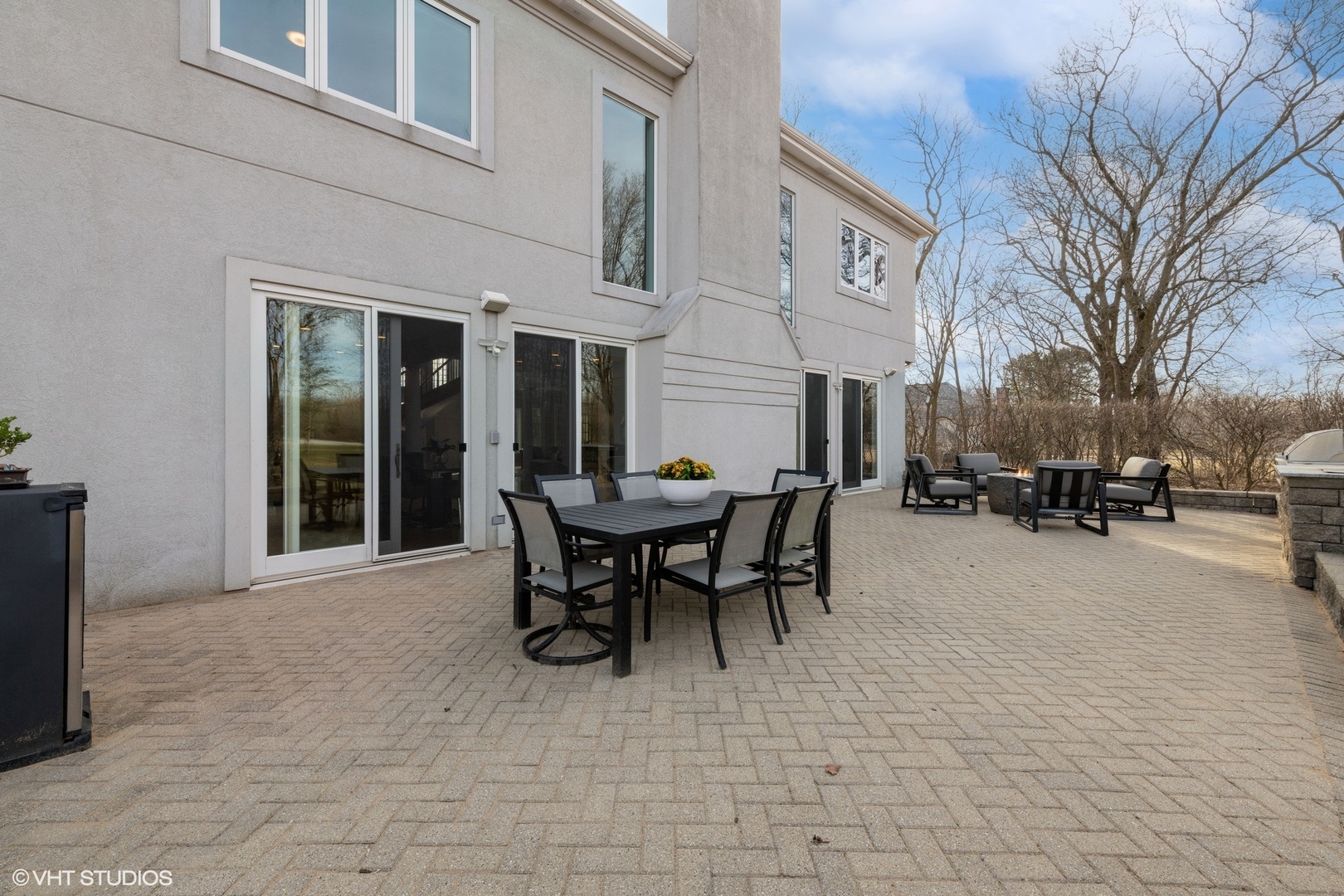 1853 Checker Road Long Grove, IL 60047 - Photo 54 of 63 a view of a patio with a table and chairs