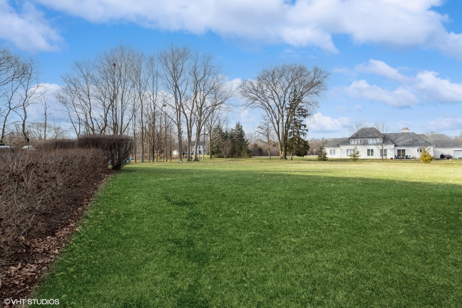 1853 Checker Road Long Grove, IL 60047 - Photo 56 of 63 a view of a golf course with a garden