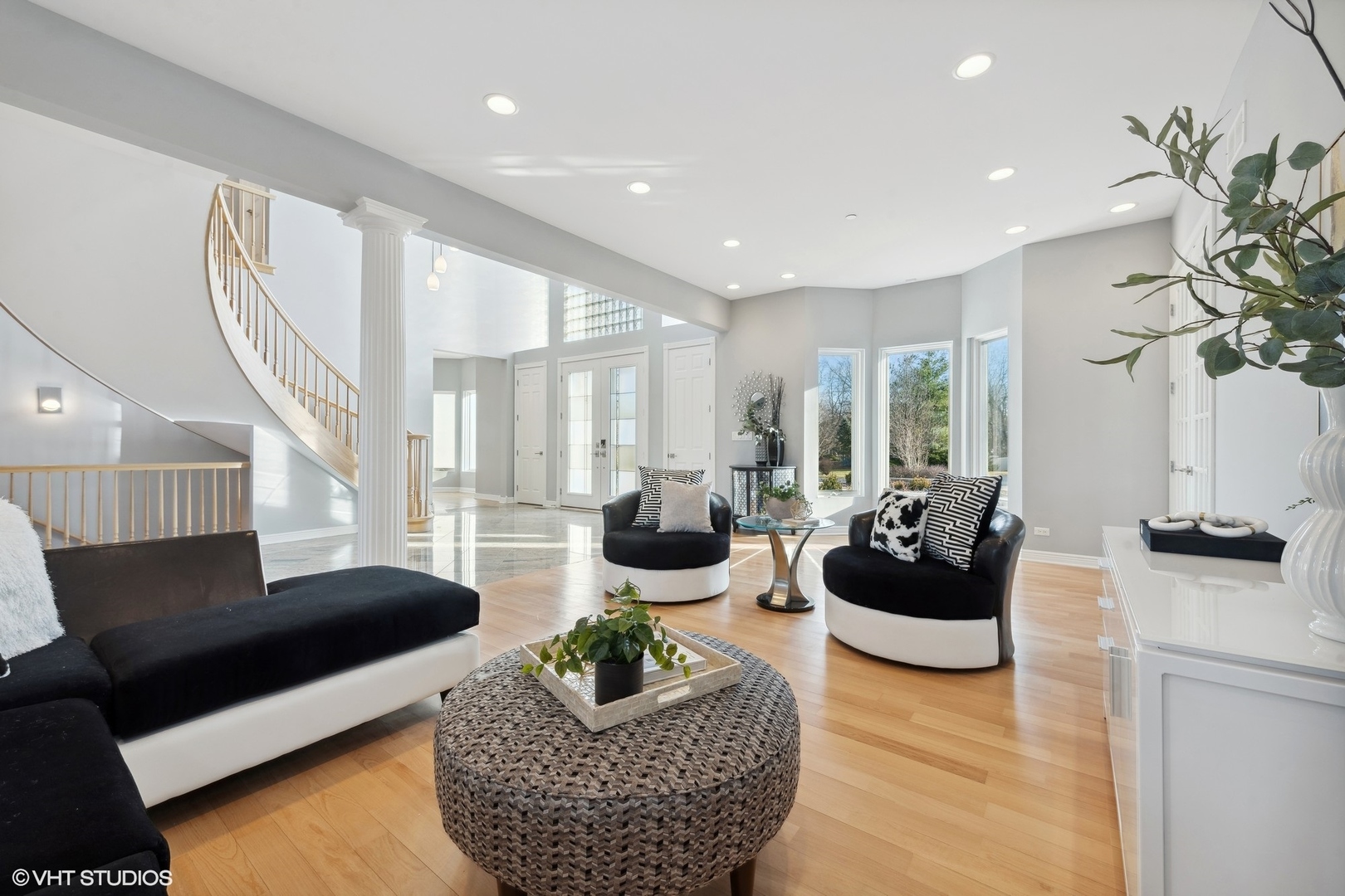 1853 Checker Road Long Grove, IL 60047 - Photo 10 of 63 a living room with furniture potted plant and a large window