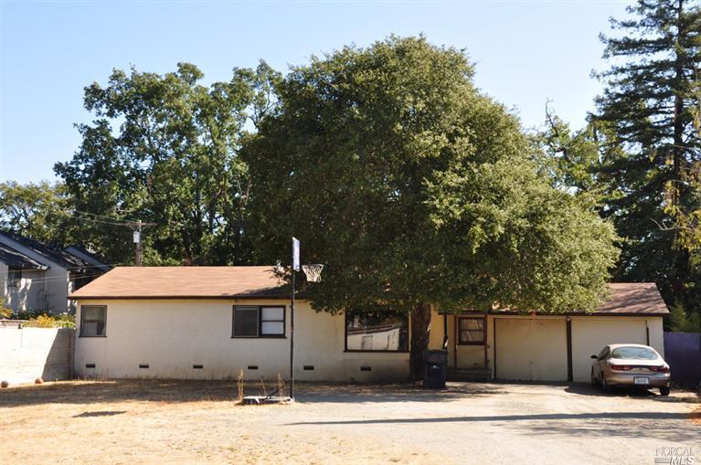 3018 Marlow Road Santa Rosa, CA 95403 - Photo 1 of 1 a front view of a house with a yard
