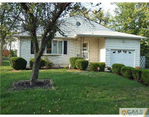 1112 New Dover Road Edison, NJ 08820 - Photo 1 of 25 a front view of house with yard and green space