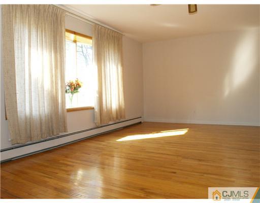 1112 New Dover Road Edison, NJ 08820 - Photo 2 of 25 a view of empty room with window