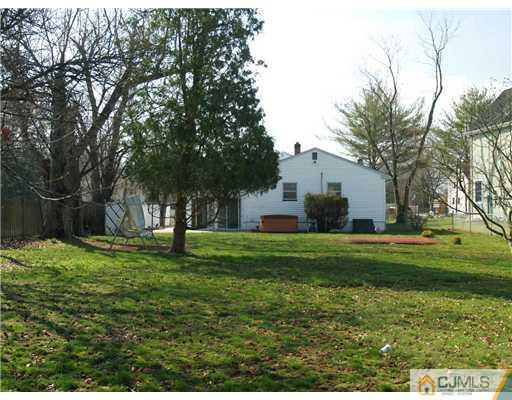 1112 New Dover Road Edison, NJ 08820 - Photo 14 of 25 a view of a house with a backyard