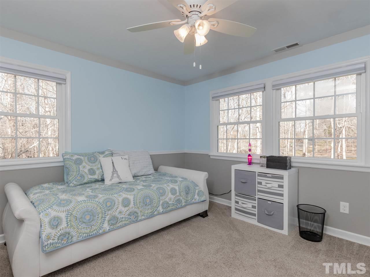 625 Ted Avenue Raleigh, NC 27614 - Photo 14 of 30 a living room with furniture and a large window