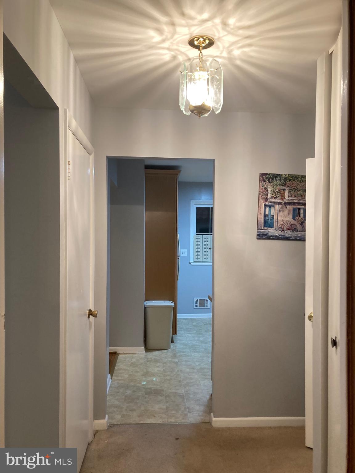 706 Crosby Road Baltimore, MD 21228 - Photo 31 of 41 a view of a livingroom with a kitchen