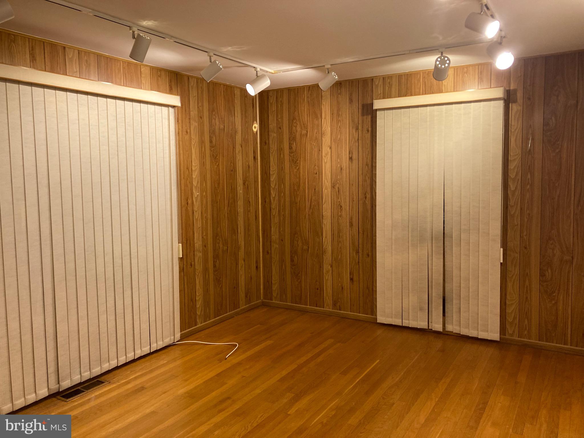 706 Crosby Road Baltimore, MD 21228 - Photo 32 of 41 a view of a small space with wooden floor