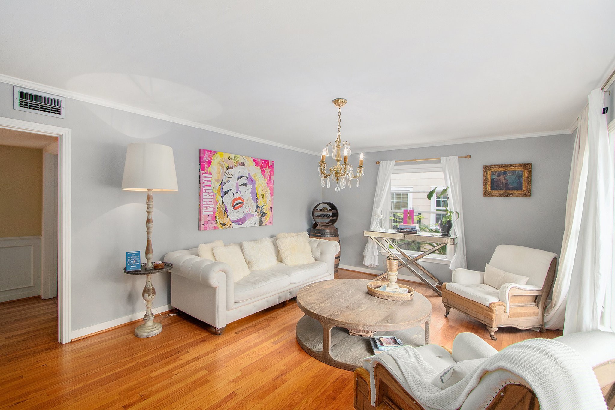 a living room with furniture and a table