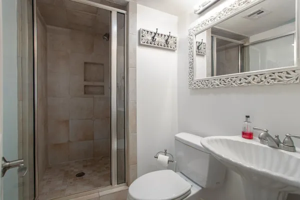 a bathroom with a sink and a toilet