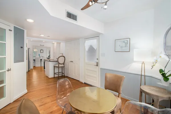 a bathroom with a tub toilet and a shower