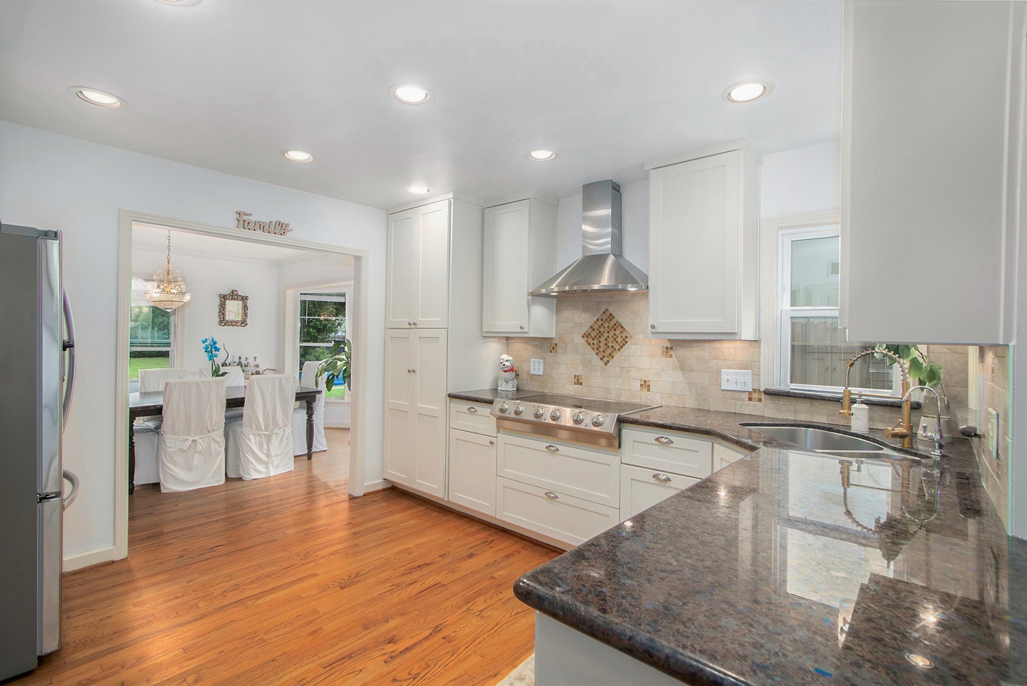 2522 Wordsworth Street Houston, TX 77030 - Photo 7 of 33 a kitchen with stainless steel appliances granite countertop a sink stove and refrigerator