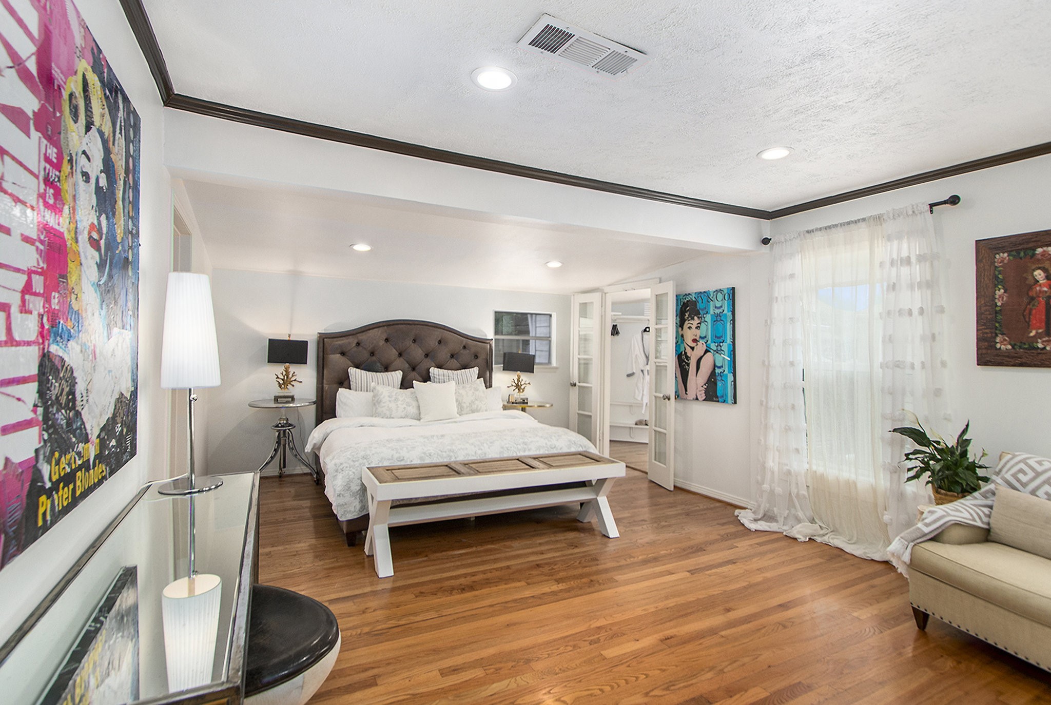 2522 Wordsworth Street Houston, TX 77030 - Photo 9 of 33 a spacious bedroom with a bed window and couch