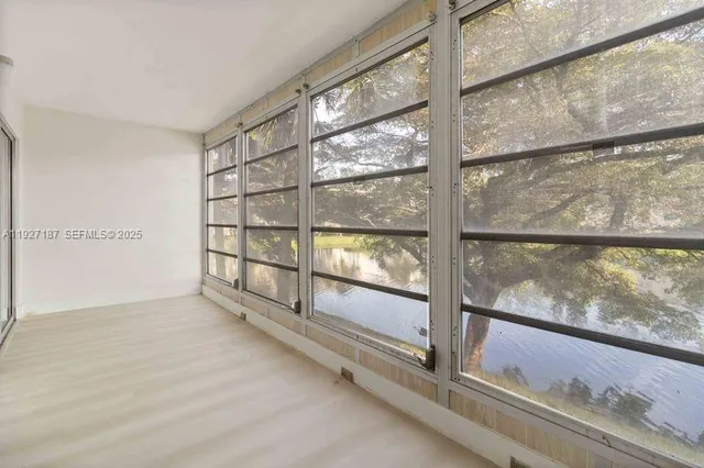 a view of a yard with an outdoor space and seating area