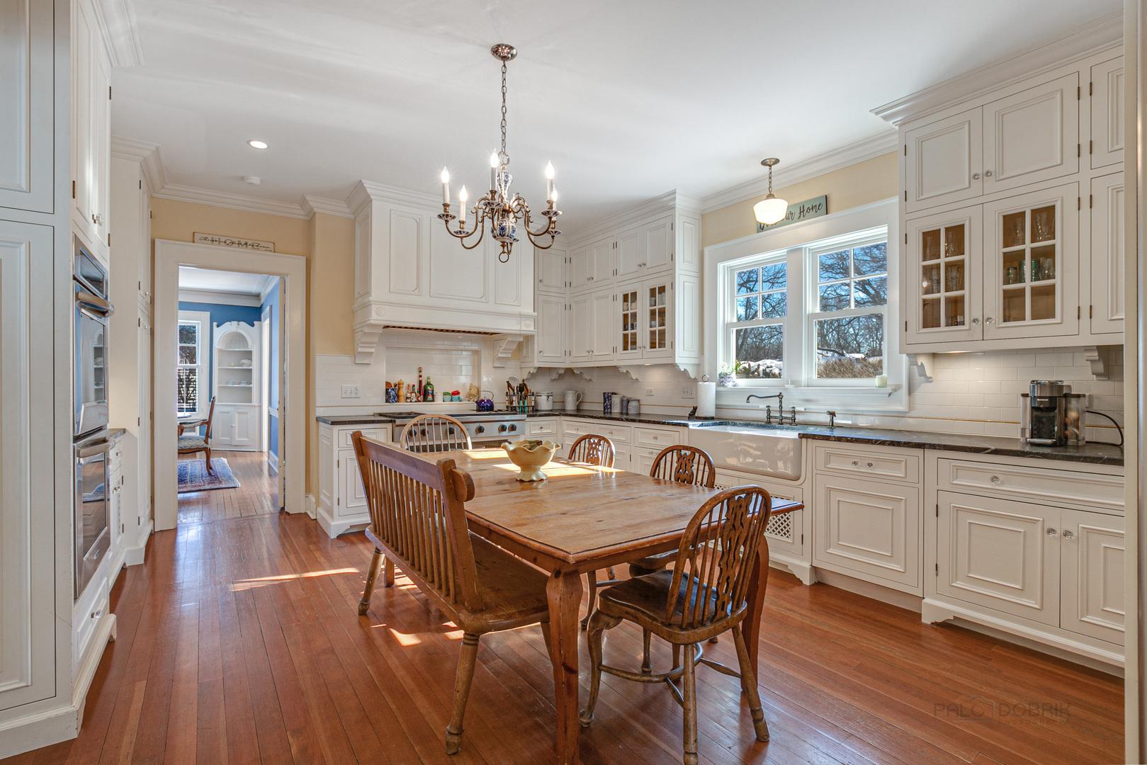 224 Maple Court Lake Forest, IL 60045 - Photo 15 of 51 a large kitchen with a table and chairs