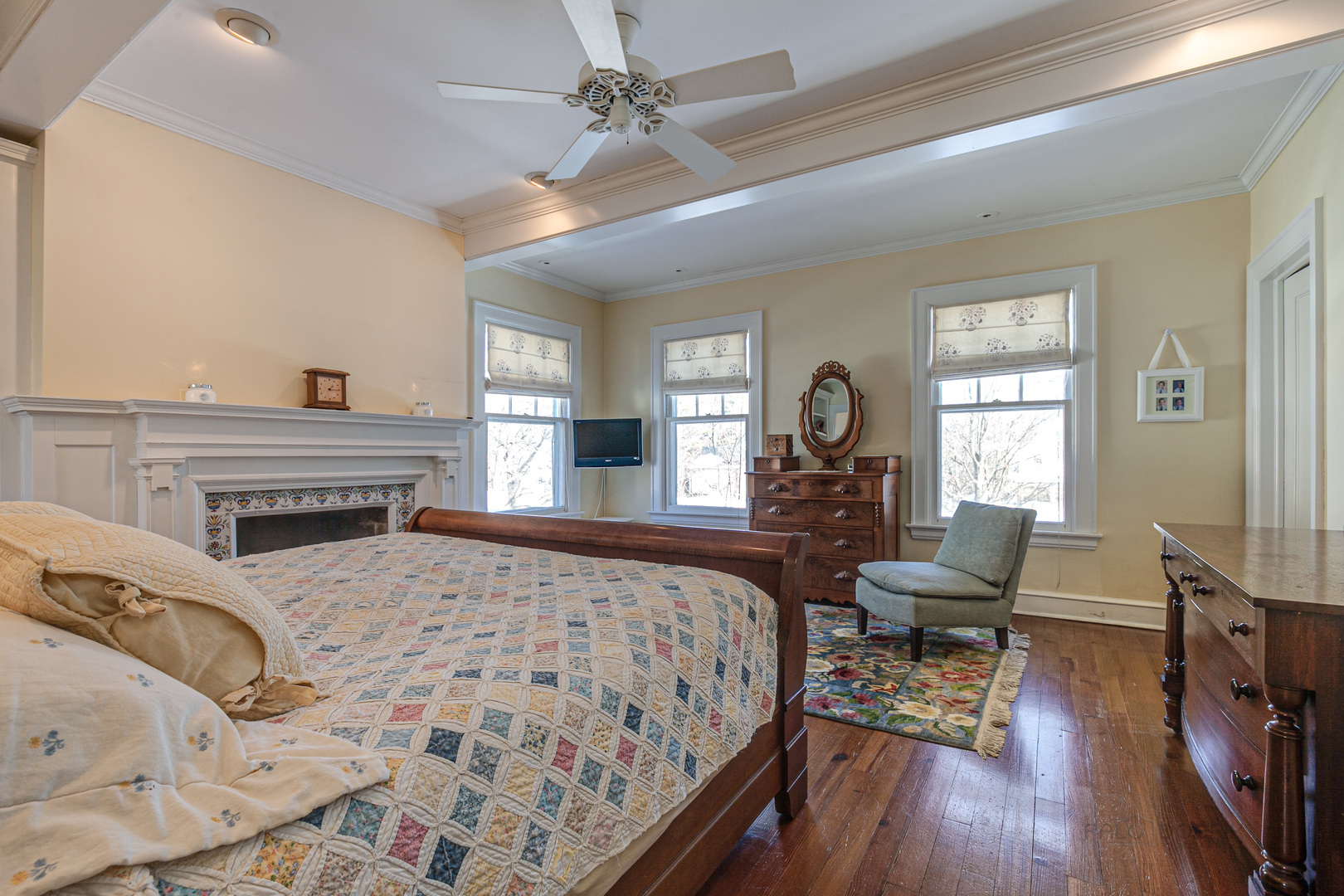 224 Maple Court Lake Forest, IL 60045 - Photo 24 of 51 a bedroom with a bed and wooden floor