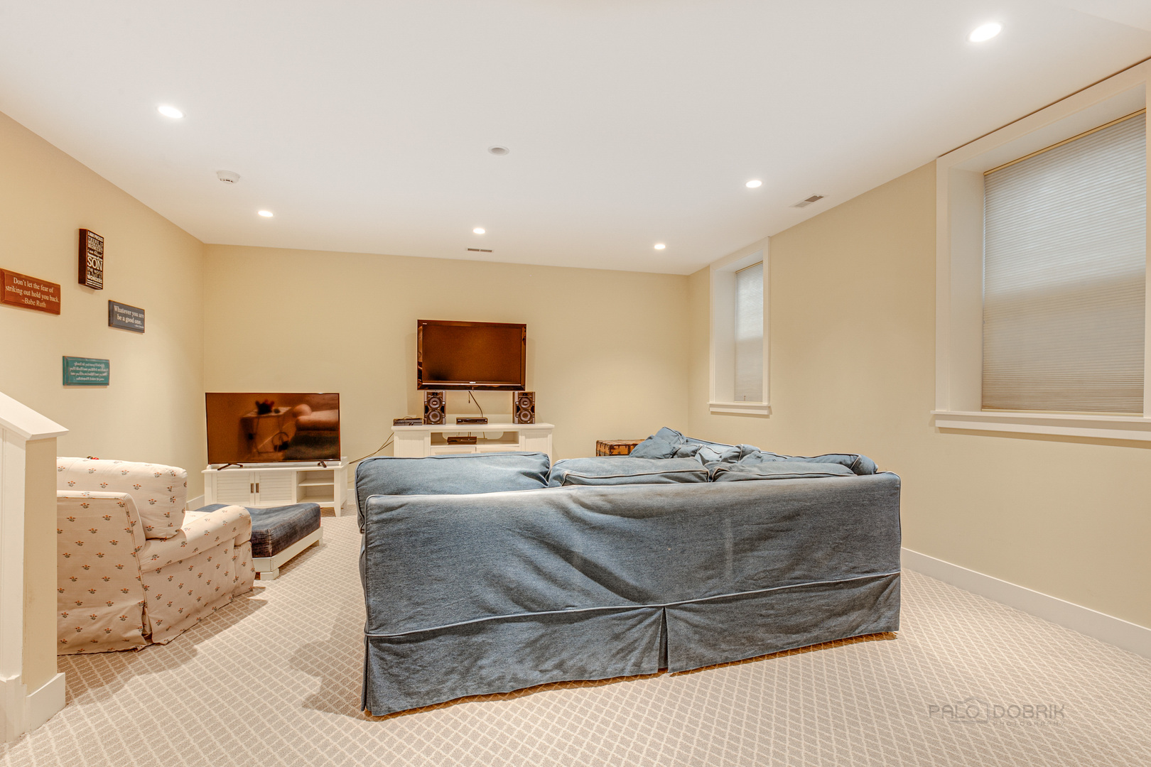 224 Maple Court Lake Forest, IL 60045 - Photo 36 of 51 a living room with furniture flat screen tv and a couch