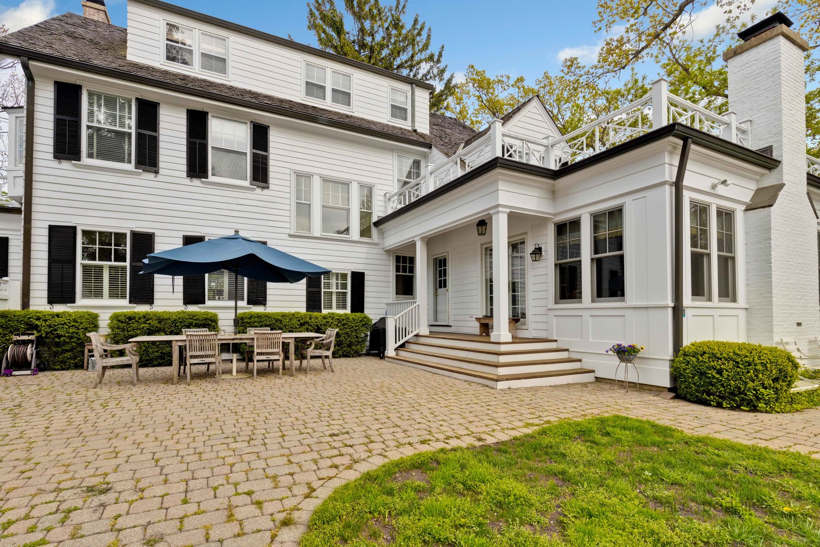 224 Maple Court Lake Forest, IL 60045 - Photo 42 of 51 a front view of a house with many windows