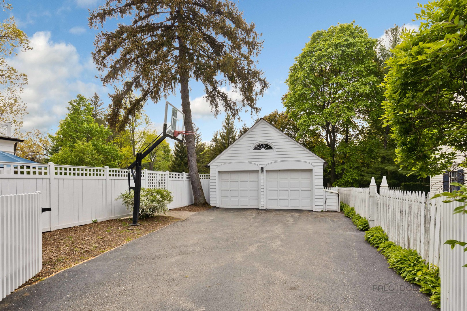 224 Maple Court Lake Forest, IL 60045 - Photo 47 of 51 a view of a house with a yard and garage
