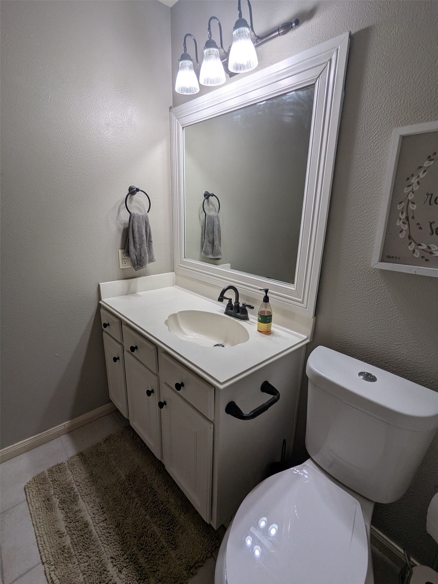 1035 North Colbert Street Dayton, TX 77535 - Photo 12 of 17 2nd bathroom with new toilet and refreshed vanity.