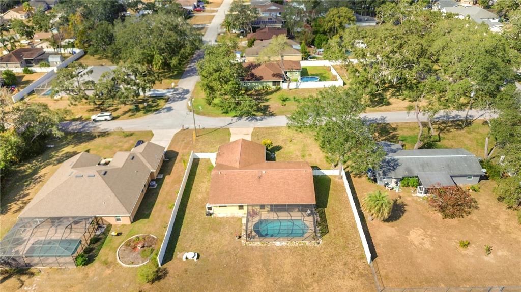 488 Fieldstone Lane Spring Hill, FL 34606 - Photo 42 of 55 an aerial view of residential houses with outdoor space