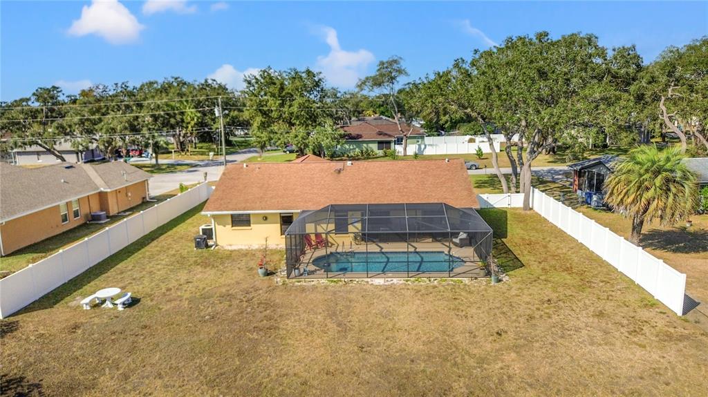488 Fieldstone Lane Spring Hill, FL 34606 - Photo 43 of 55 a view of a swimming pool with a patio