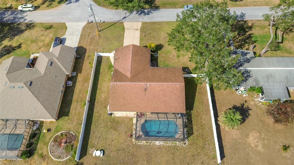 488 Fieldstone Lane Spring Hill, FL 34606 - Photo 46 of 55 an aerial view of a house with a yard