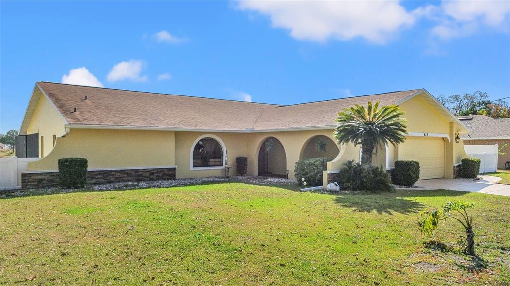 488 Fieldstone Lane Spring Hill, FL 34606 - Photo 49 of 55 a front view of house with yard