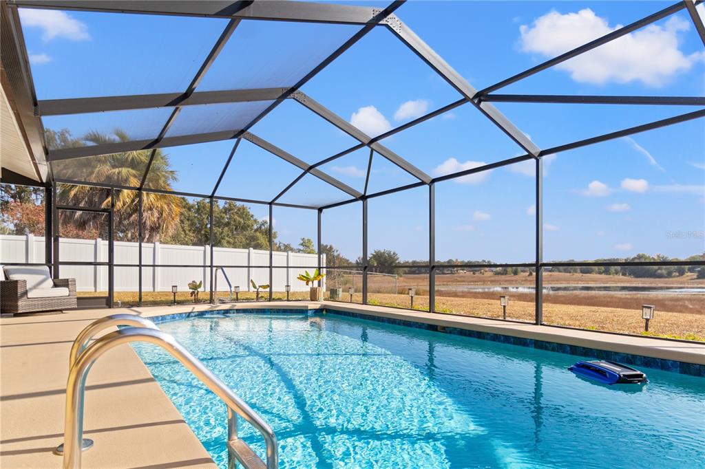 488 Fieldstone Lane Spring Hill, FL 34606 - Photo 6 of 55 a view of a swimming pool