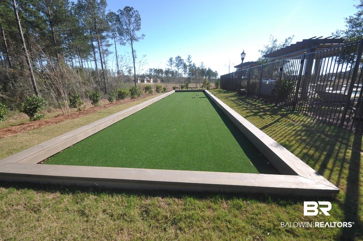 32125 Lyon Road Daphne, AL 36527 - Photo 48 of 70 Bocce court featuring artificial turf playing surface and wood-finish perimeter
