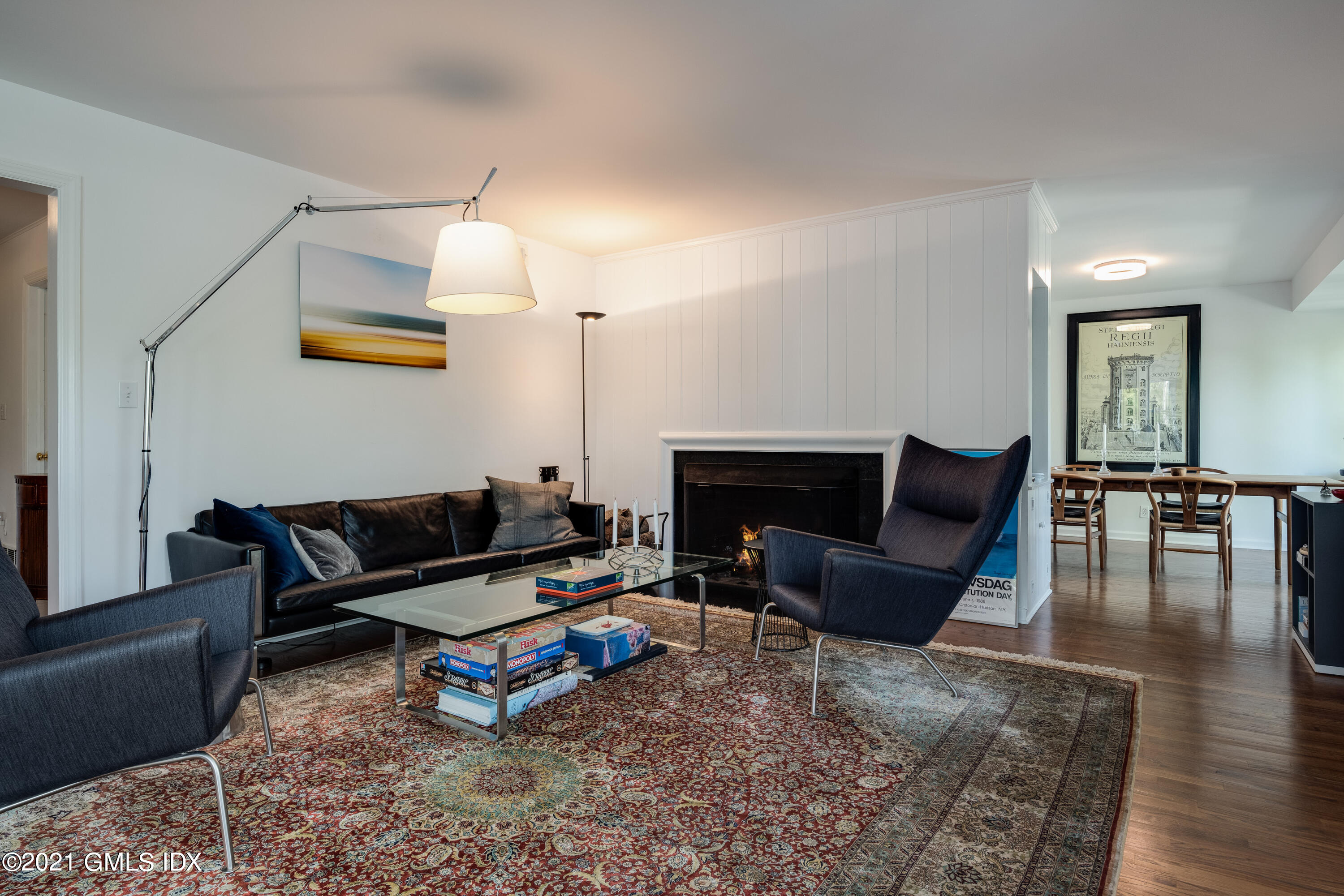 90 Oneida Drive Greenwich, CT 06830 - Photo 11 of 30 a living room with furniture and a fireplace