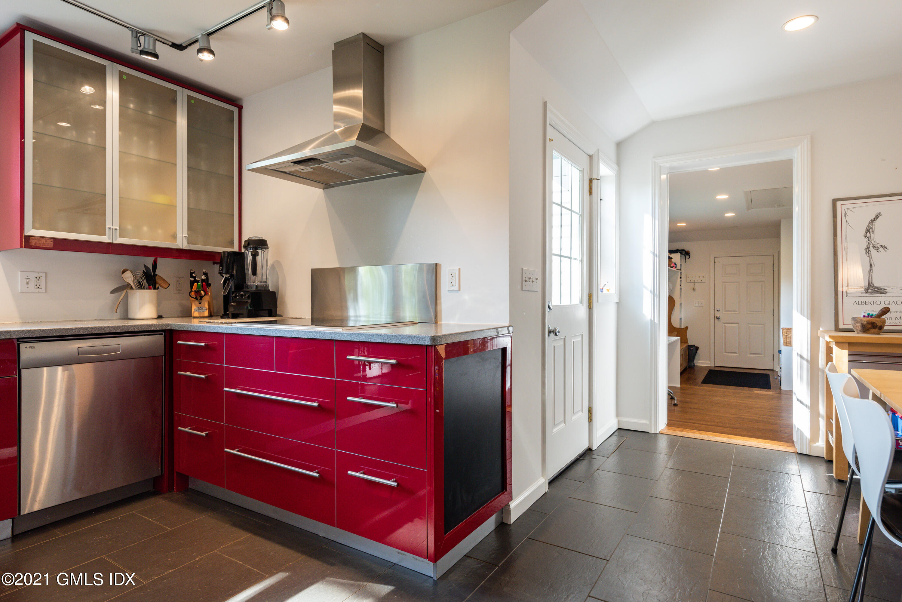 90 Oneida Drive Greenwich, CT 06830 - Photo 17 of 30 a kitchen with stainless steel appliances granite countertop a refrigerator and a sink