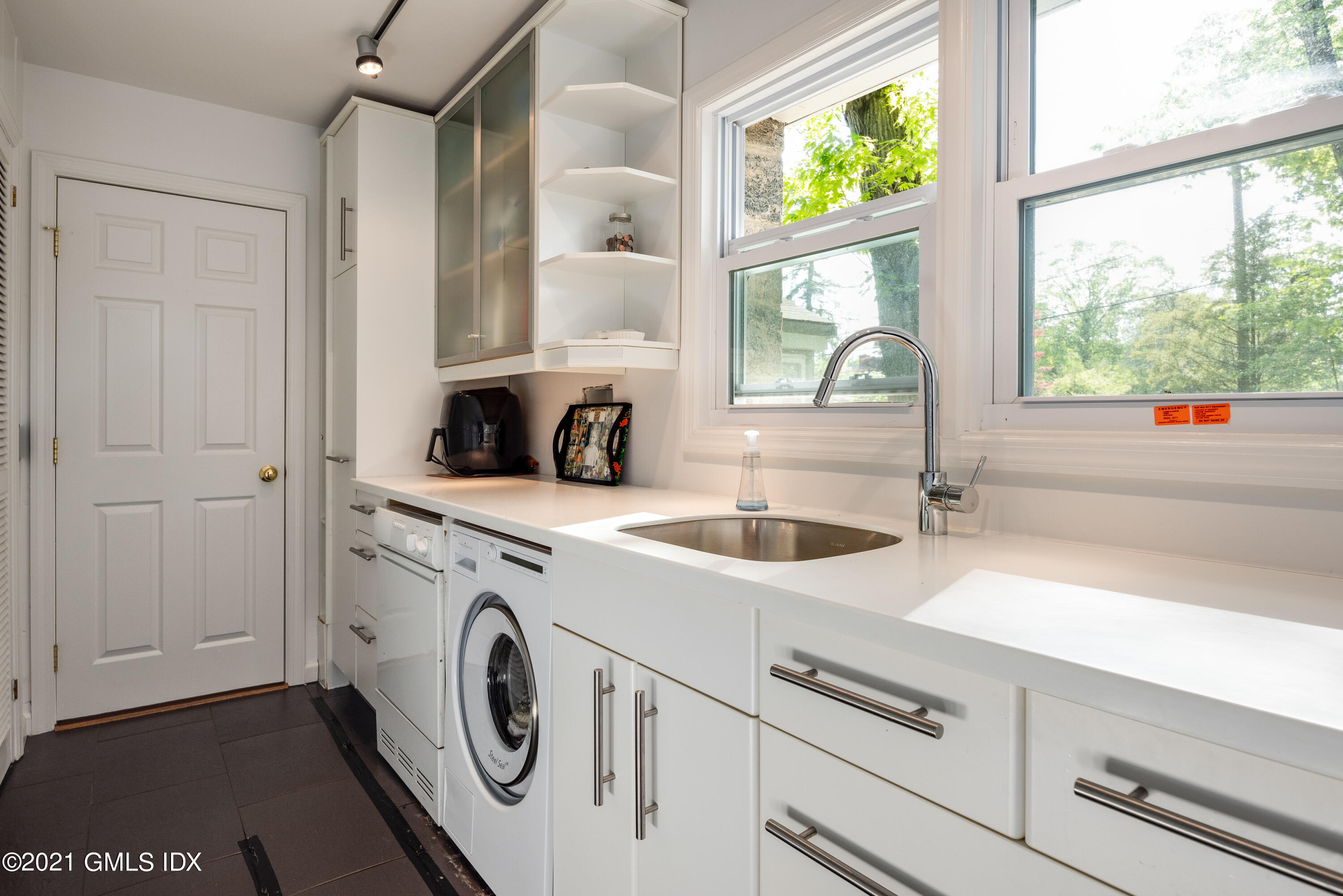 90 Oneida Drive Greenwich, CT 06830 - Photo 18 of 30 a view of a kitchen sink and a window