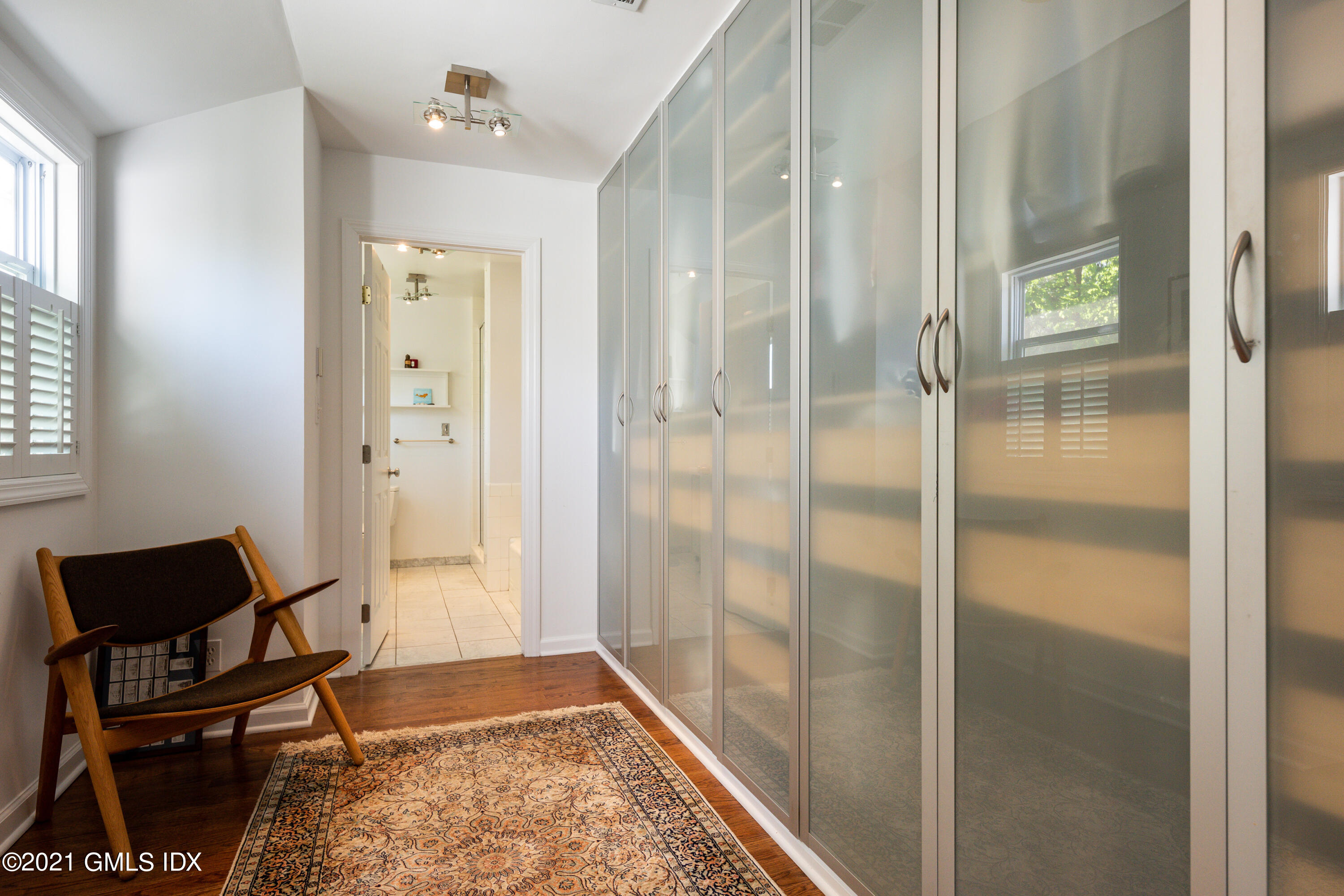 90 Oneida Drive Greenwich, CT 06830 - Photo 21 of 30 a bathroom with a bathtub and shower