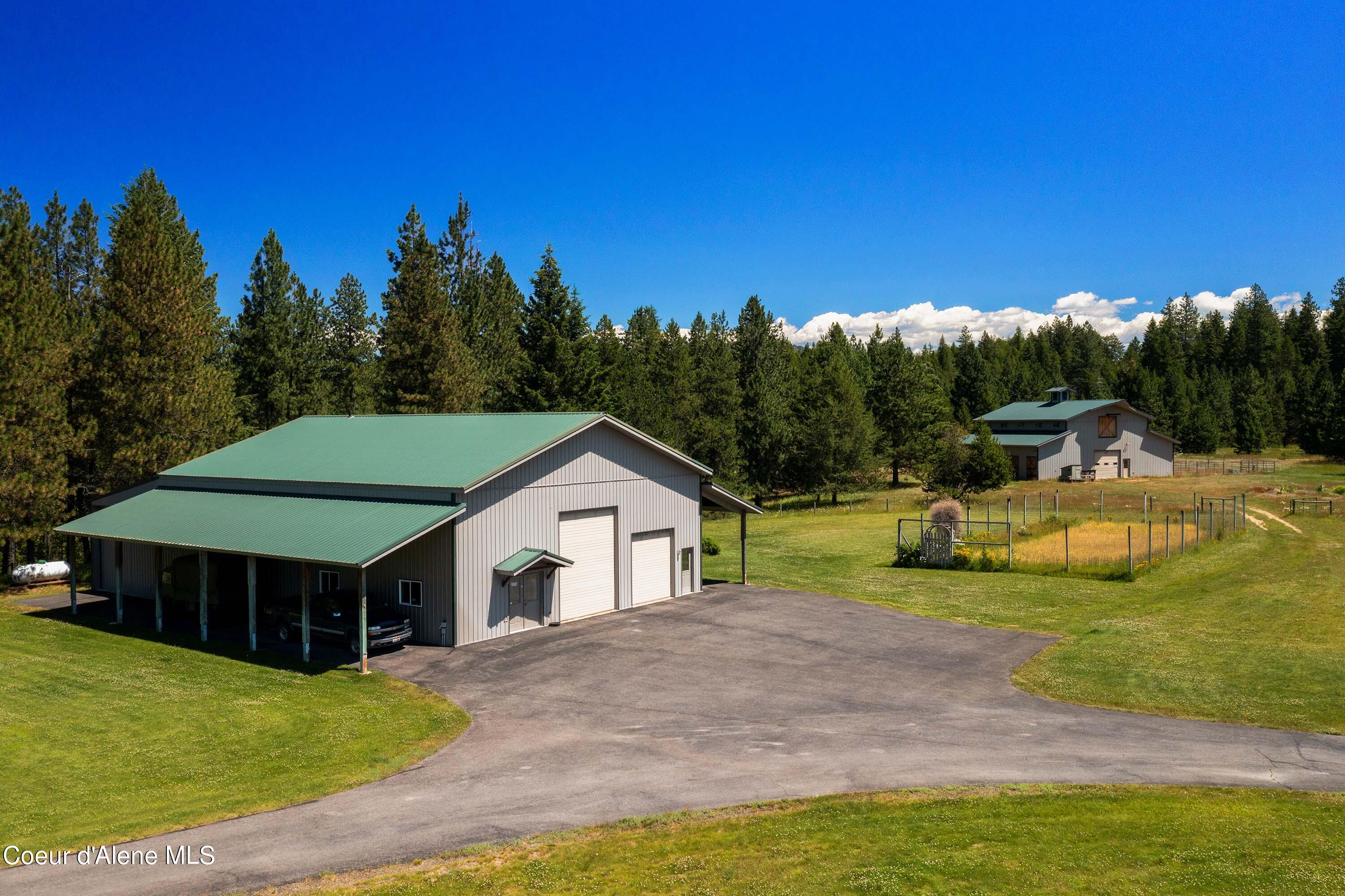 877 Heath Lake Road Sagle, ID 83860 - Photo 3 of 60 Aerial Shop Barn and Garden