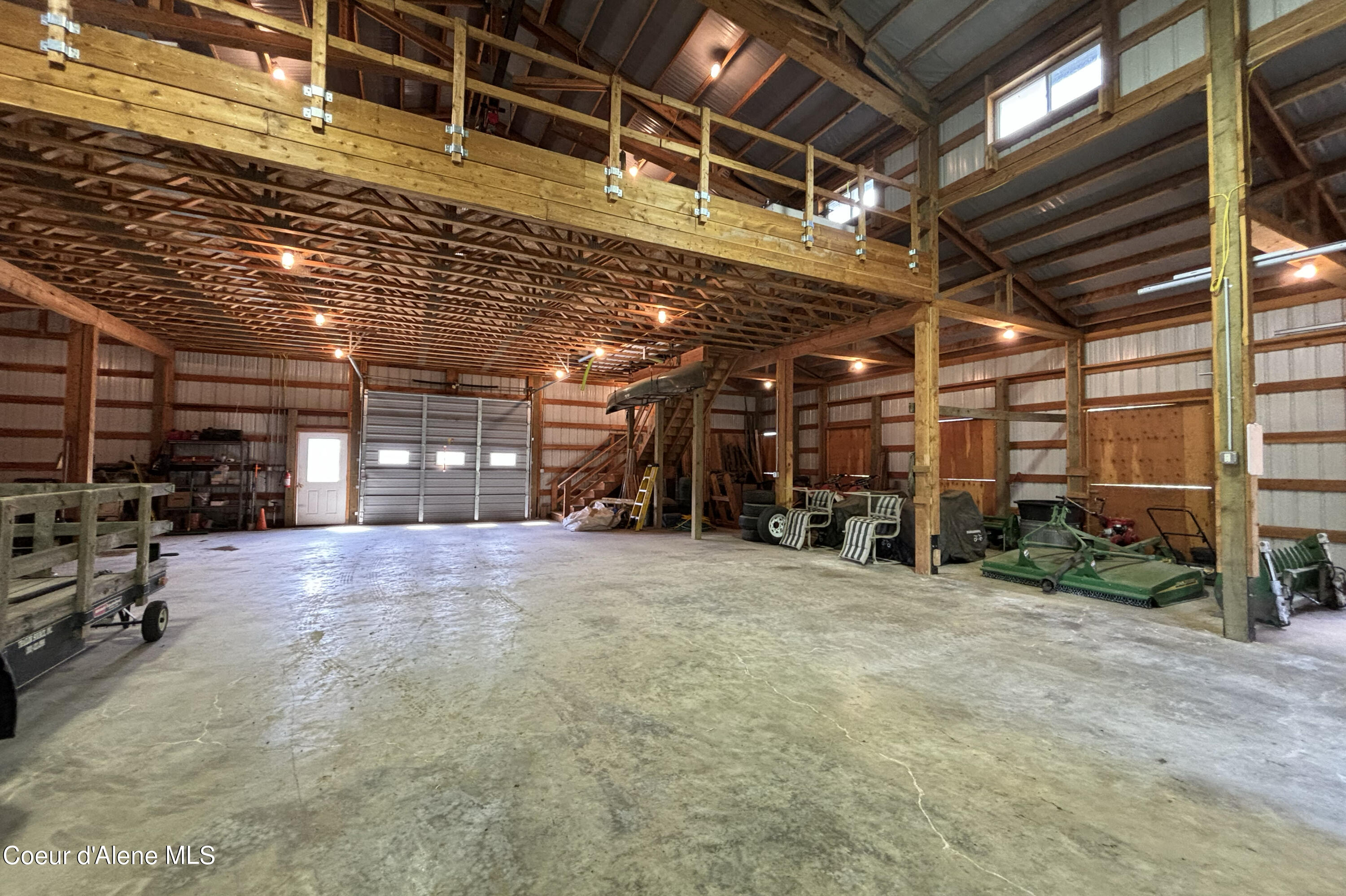 877 Heath Lake Road Sagle, ID 83860 - Photo 48 of 60 Barn Interior Stall Doors