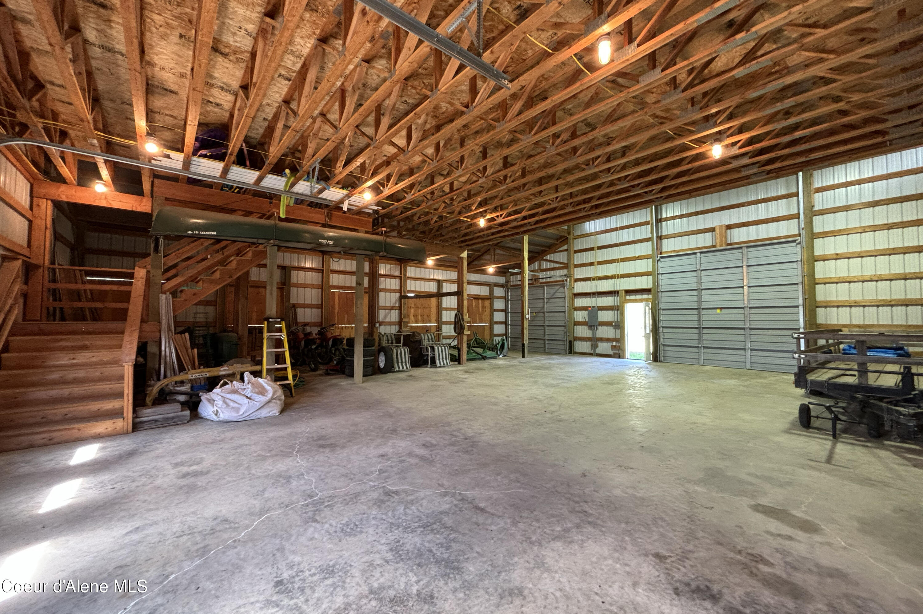 877 Heath Lake Road Sagle, ID 83860 - Photo 49 of 60 Barn Interior Loft Stairs