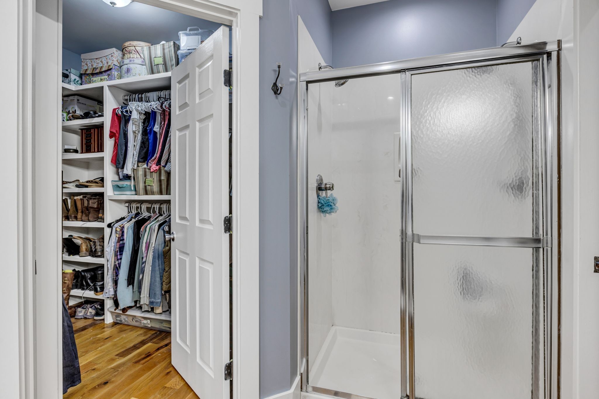 6770 Bly-Trice Road College Grove, TN 37046 - Photo 16 of 58 a view of walk in closet with clothes and shoes