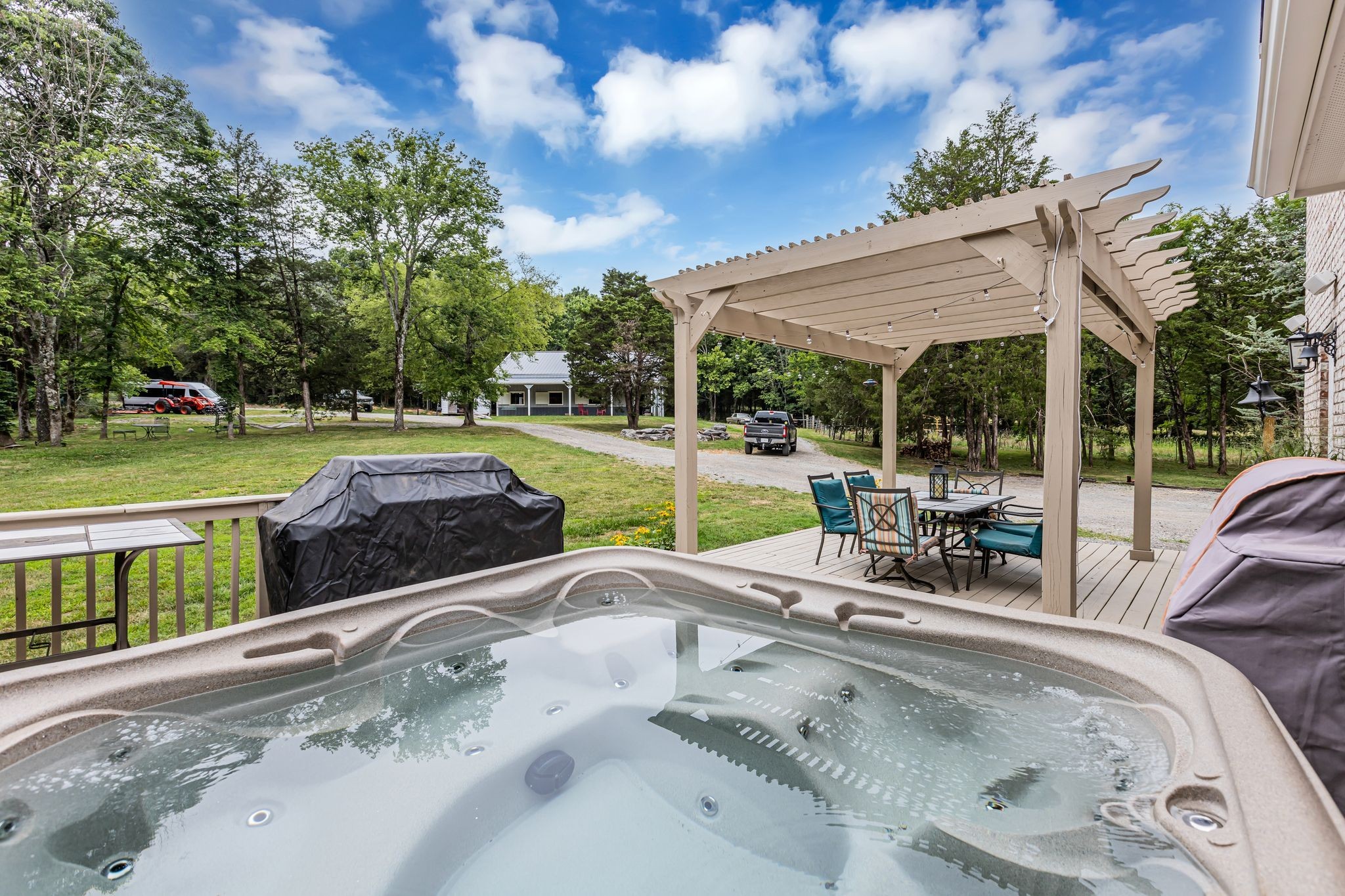 6770 Bly-Trice Road College Grove, TN 37046 - Photo 20 of 58 a view of a backyard with sitting area
