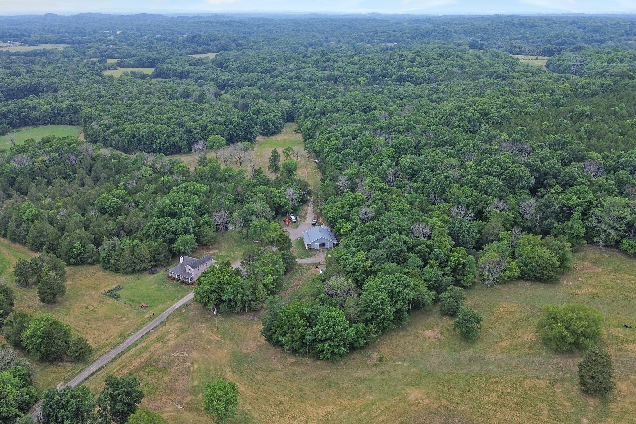 6770 Bly-Trice Road College Grove, TN 37046 - Photo 48 of 58 an aerial view of a house with a yard