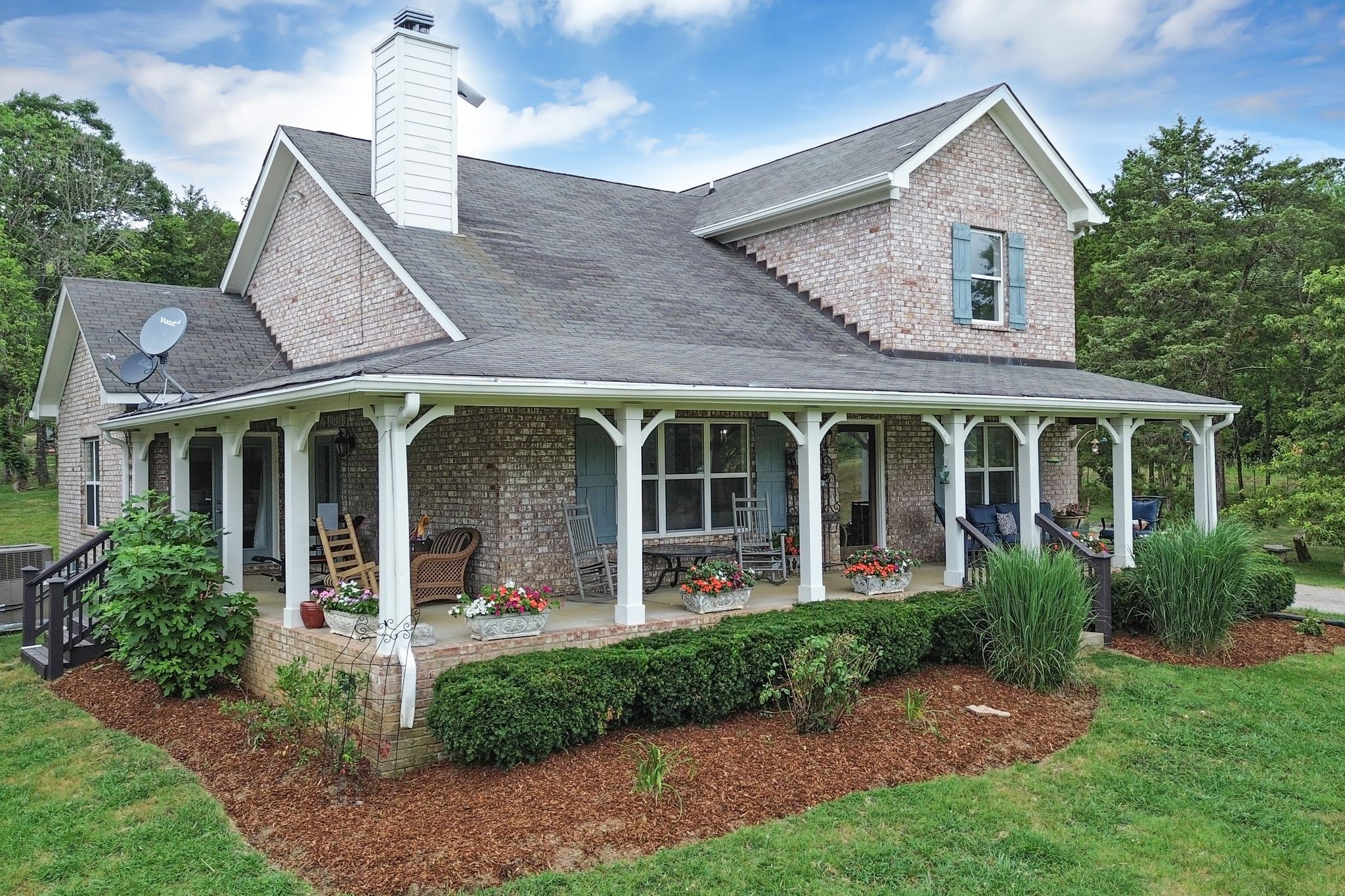 6770 Bly-Trice Road College Grove, TN 37046 - Photo 50 of 58 a front view of a house with garden