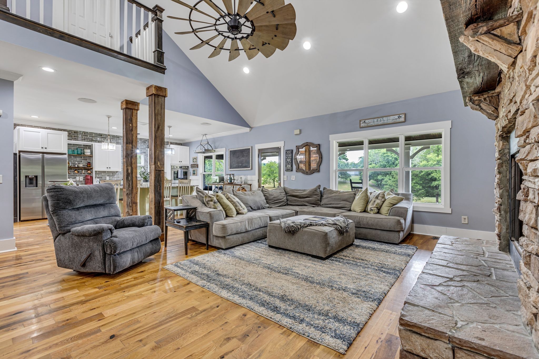 6770 Bly-Trice Road College Grove, TN 37046 - Photo 5 of 58 a living room with furniture or couch and a large window