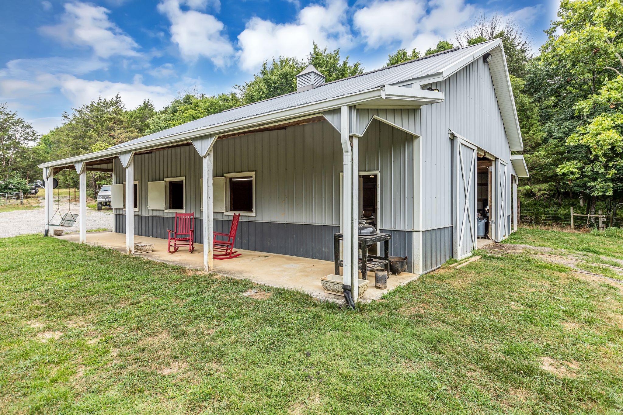 6770 Bly-Trice Road College Grove, TN 37046 - Photo 54 of 58 a view of a house with backyard and porch