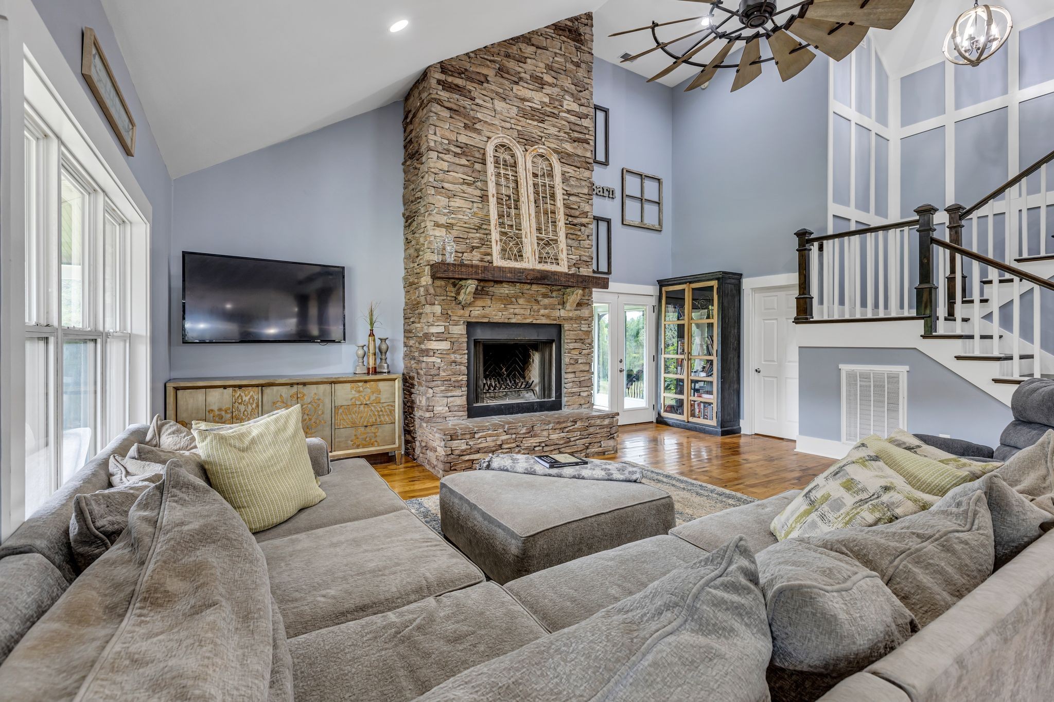 6770 Bly-Trice Road College Grove, TN 37046 - Photo 6 of 58 a living room with furniture or couch and a fireplace