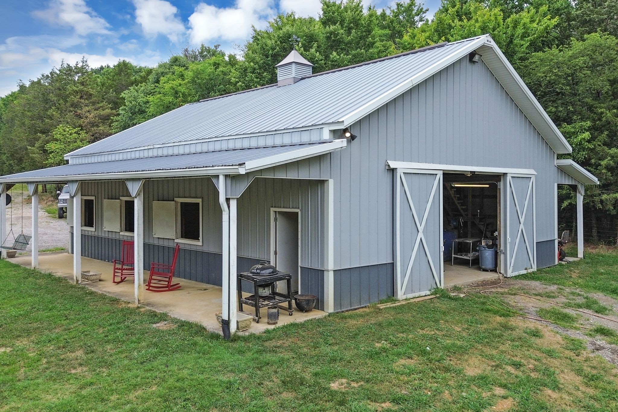 6770 Bly-Trice Road College Grove, TN 37046 - Photo 7 of 58 a view of an house with backyard porch and garden