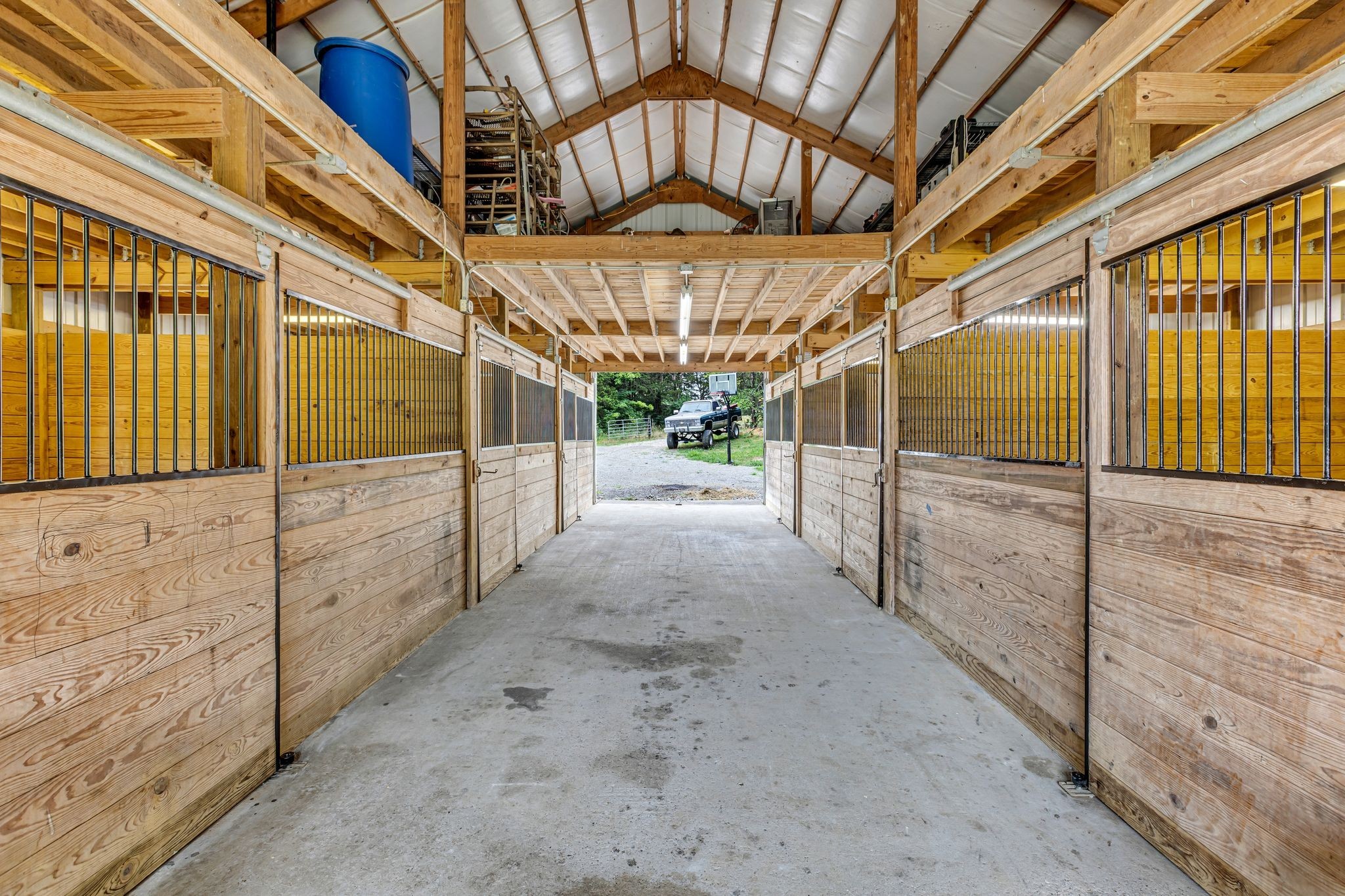 6770 Bly-Trice Road College Grove, TN 37046 - Photo 8 of 58 a view of a porch with a wooden roof