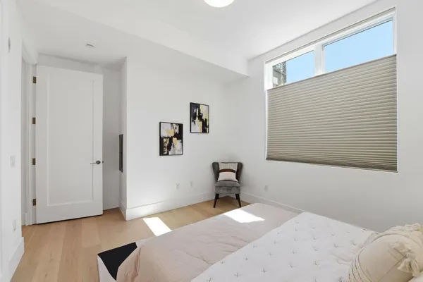 a bathroom with a tub and shower