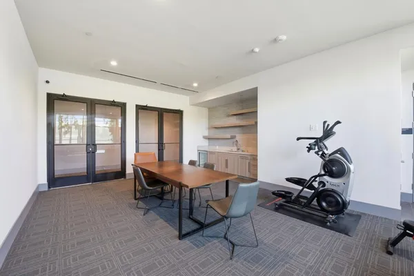 a front view of a house with seating space