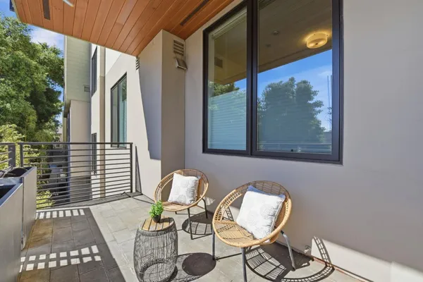 a outdoor space with lots of tables and chairs